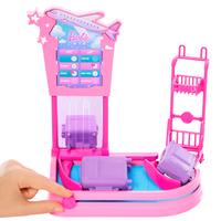 Barbie Malibu-docka med resväska och bagagekarusell