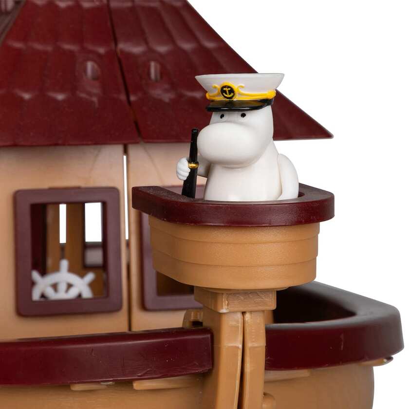 Mumin, skeppet Haffsårkestern och en figur